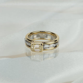 Yellow Diamond ring in a substantial setting. 