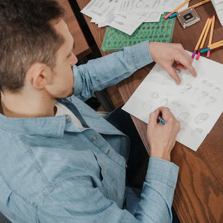 Hand-drawn custom ring design sketch at the Atelier Fine Co. studio in Vancouver.