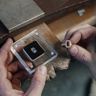 Loose Diamond beside a ring shank before setting.