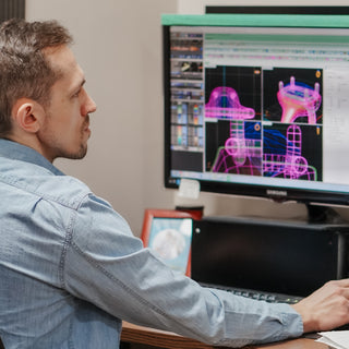 CAD model of a custom ring on screen during the design stage.