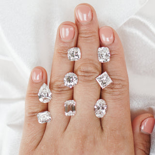 Loose Diamonds held in the hand at the Vancouver studio.
