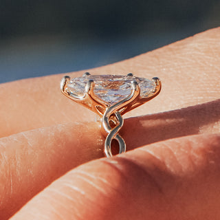 Side view of a marquise engagement ring showing the setting profile.