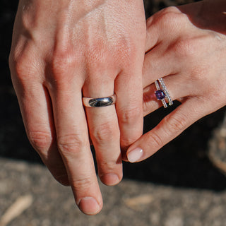 Gold and platinum ring bands side by side showing metal color differences.