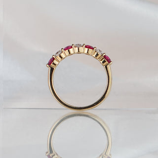 Ruby and Diamond alternating band standing upright with reflection, shared claws and polished back in frame.