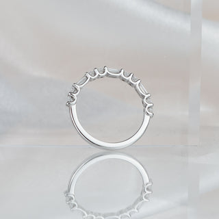 Alternating baguette and round brilliant band standing upright with reflection, cut contrast visible along the top edge.