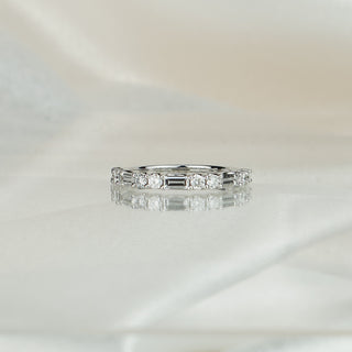 Side view of an alternating cut lab diamond band in white gold, stones tapering to a slim 1.8mm back.