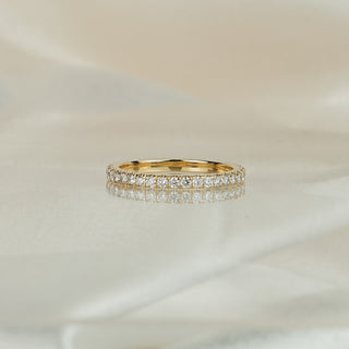 Side view of a lab diamond micro pavé band in yellow gold, 2.0mm width tapering to a plain polished back.