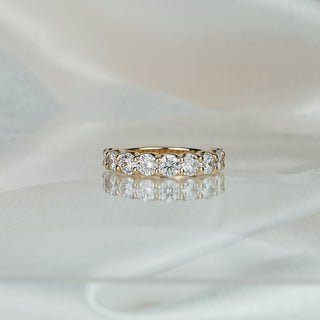 Yellow gold half eternity band with scallop set lab grown diamonds, 4.0mm stone row across the front.
