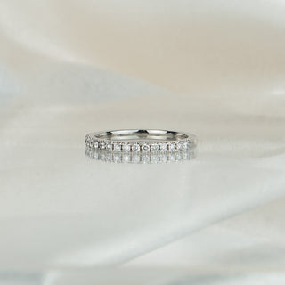 Side view of a lab diamond micro pavé wedding band, 1.6mm stones in a continuous row along the band.