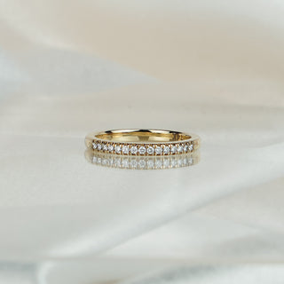 Yellow gold micro pavé band with fifteen natural Diamonds set along the front, fine stone row at 2.35mm width.