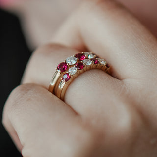 Burmese Ruby and Diamond alternating band worn on the hand, red and white stones in a shared claw row.
